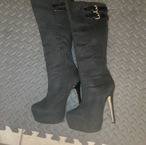 Knee high black stiletto boots